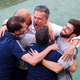 Luis Enrique celebrates with other members of Spain’s coaching staff after a rollercoaster of a match.